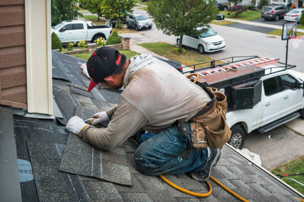 Professional Roofing technician working in Bunker Hill, OR